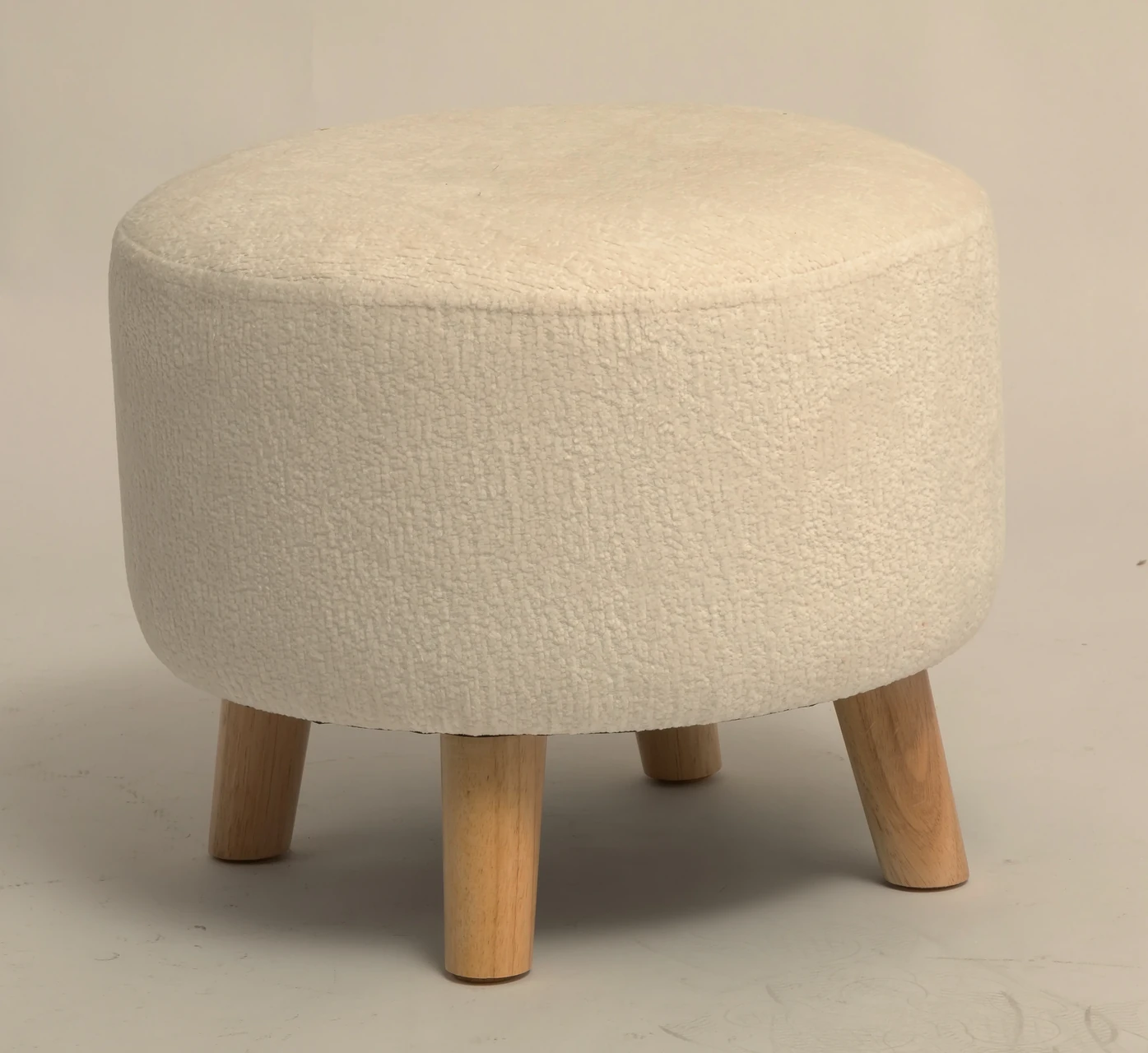 Round Upholstered Footstool with Wooden Legs