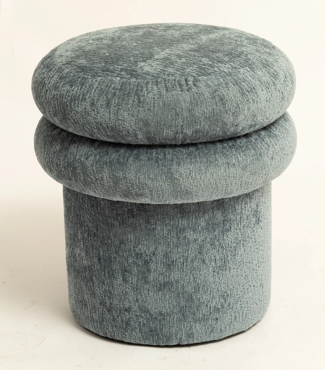 Round upholstered fabric stool